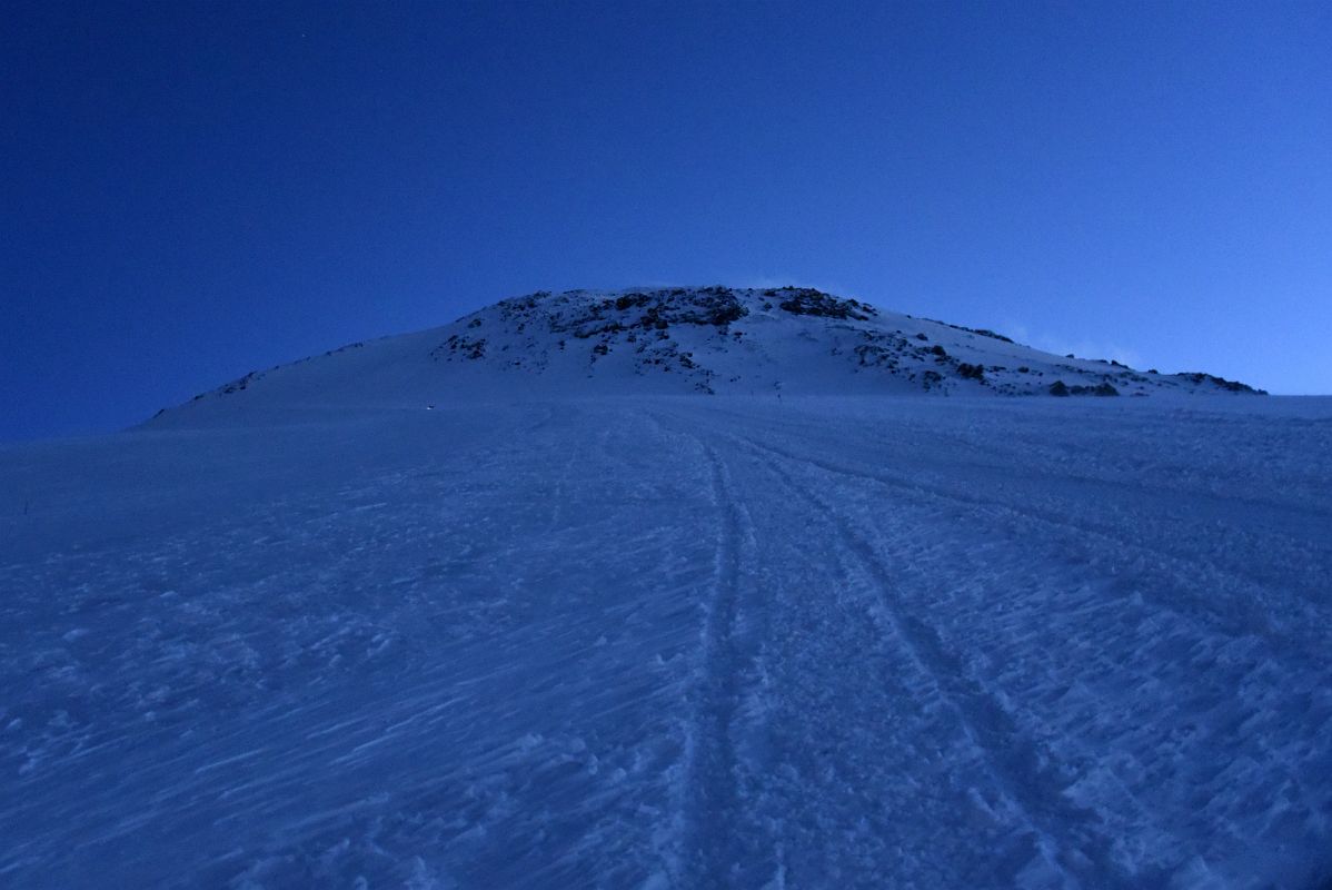 01C Looking Up At The Steep Trail To The Traverse With Mount Elbrus East Summit Above From Near Beginning Of Mount Elbrus Climb